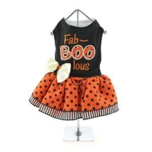 A black and orange polka dot dress with the words " fab boo boo ".