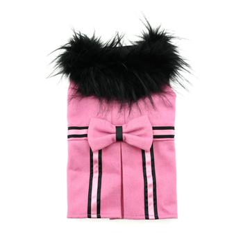 A pink coat with black trim and bow tie.