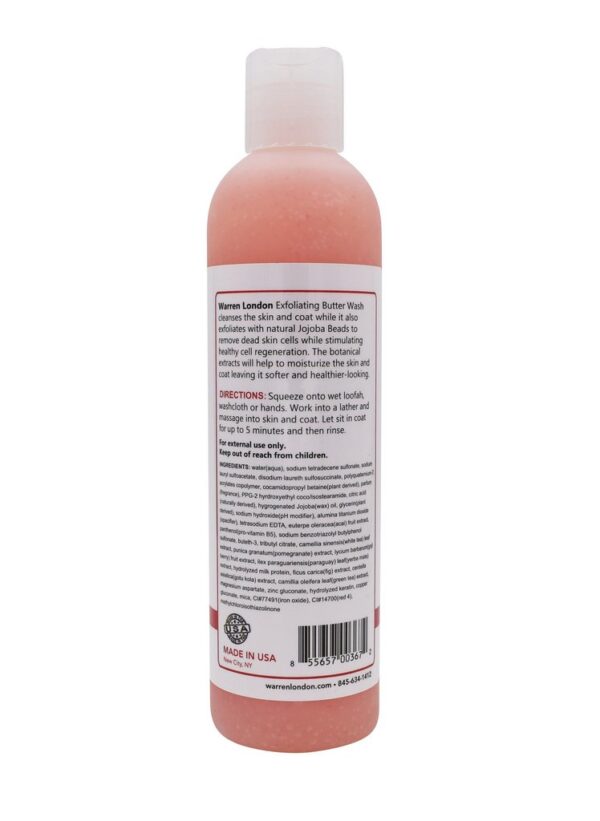 A bottle of pink shampoo is shown.