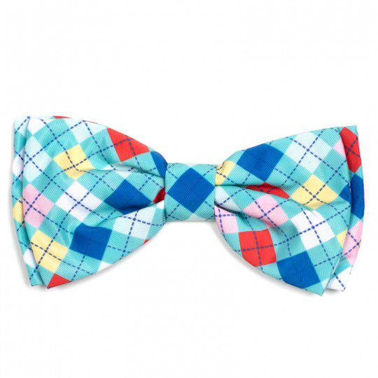 A bow tie with colorful argyle pattern on it.