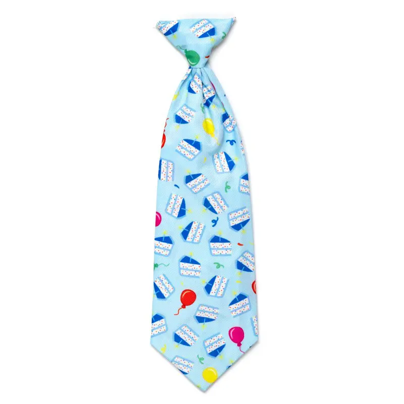 A tie with balloons and ice cream on it.
