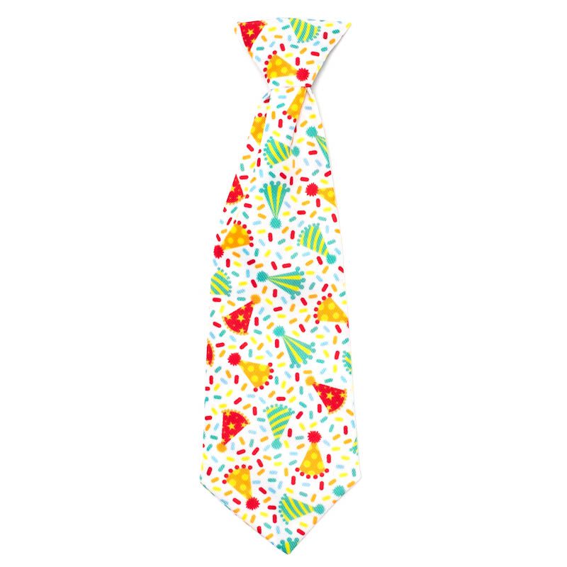 A tie with colorful party hats and confetti on it.