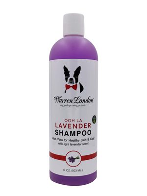 A bottle of dog shampoo with a picture of a dog.