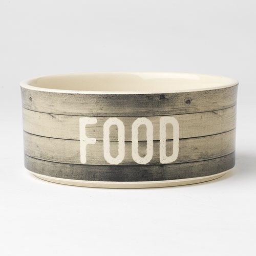 A bowl that says food on it.
