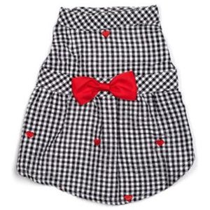 A black and white checkered dress with red bow.