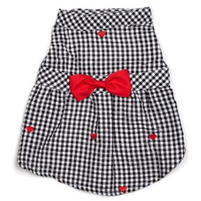 A black and white checkered dress with red bow.