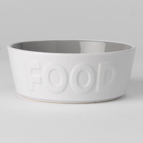 A bowl that says food in the middle of it.