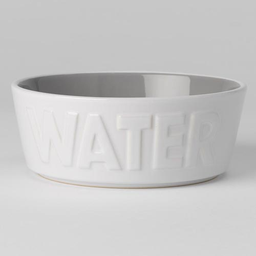 A white bowl with the word water on it.