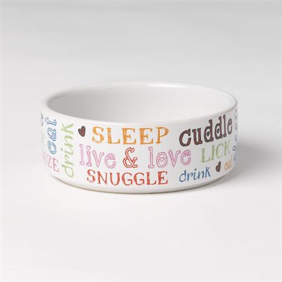 A white bowl with the words " cuddle " and " snuggle ".