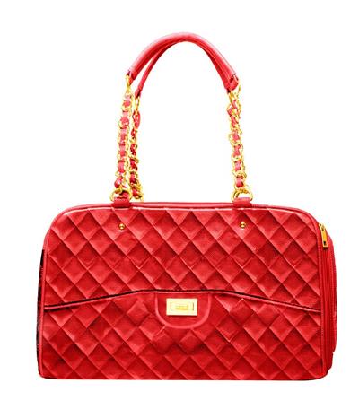 A red purse with gold chain handles and a quilted pattern.