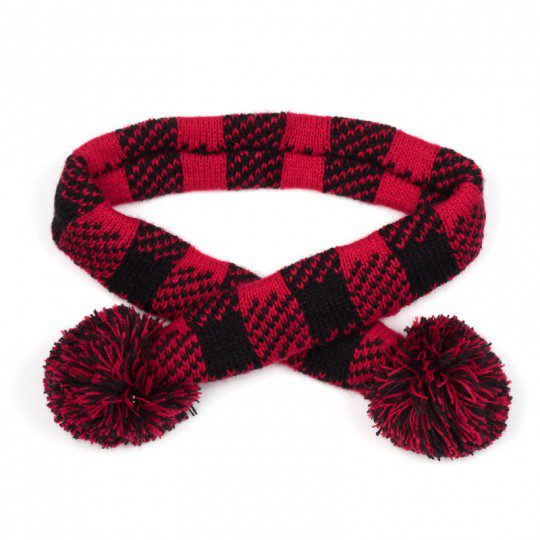 A red and black scarf with two pom poms.