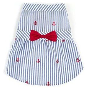 A striped shirt with red bow tie and anchors on it.