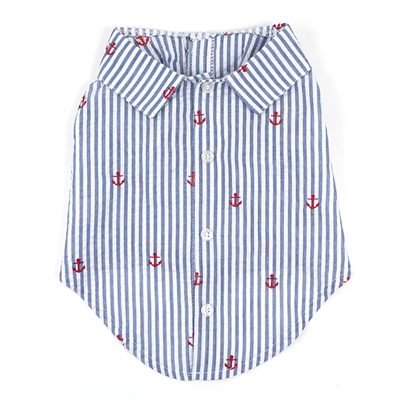 A shirt that has red anchors on it.