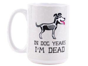 A white coffee mug with an image of a dog.