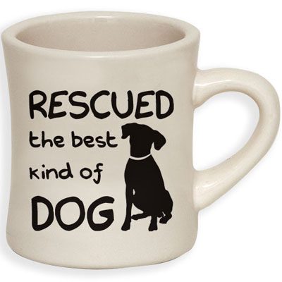 A coffee mug with the words " rescued the best kind of dog ".