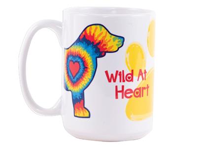 A white mug with a colorful dog and paw print.
