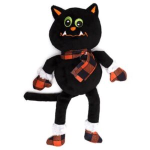 A black cat with red and orange accents is wearing a scarf.