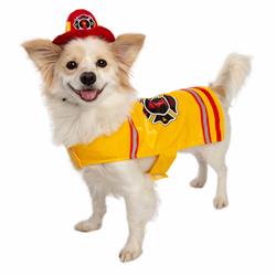 A dog wearing a fireman 's outfit and hat.